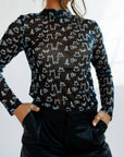 Black Brand Sheer Mock Neck Top